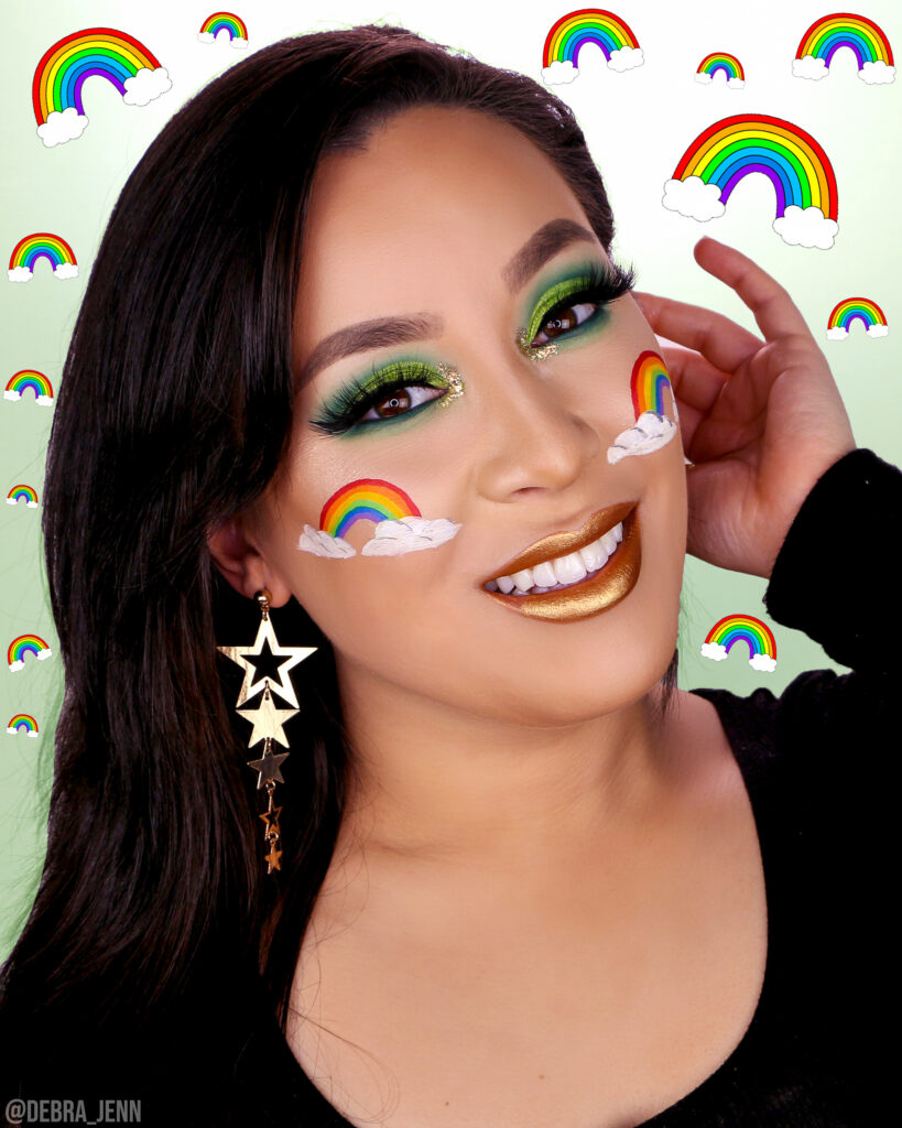 St Patricks Day Makeup with green eyeshadow and rainbow on cheeks