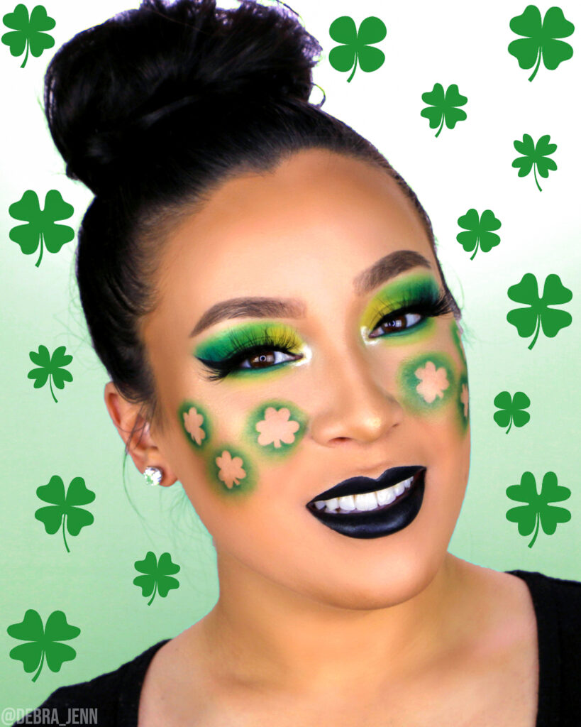 St Patricks Day Makeup with green eyeshadow and shamrocks on cheeks