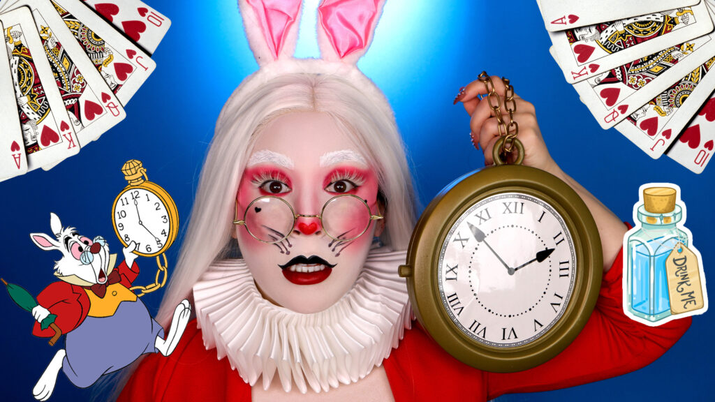 White Rabbit Makeup for Halloween Costume with white face paint, red eyeshadow, bunny ears, holding clock