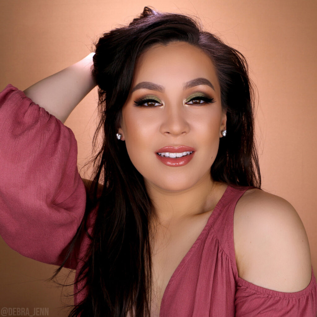 Debra Jenn wearing an olive green and brown eyeshadow look perfect for brown eyes