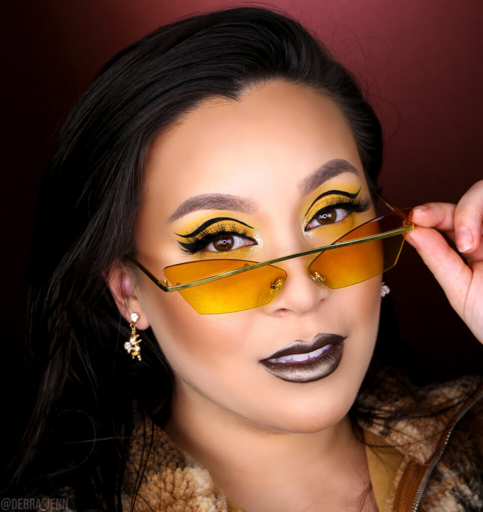 debra jenn in yellow eyeshadow with graphic liner