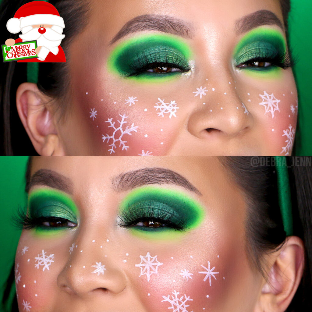 Debra Jenn in green Christmas makeup look with green eyeshadow and snowflakes drawn on cheeks