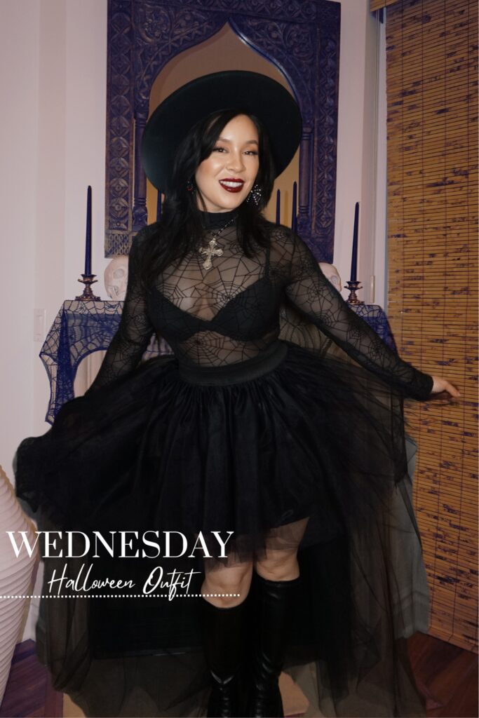 All Black Halloween Outfits: black high low skirt with spiderweb bodysuit